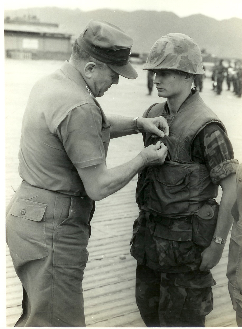General Walt presents Bronze star to Charnell